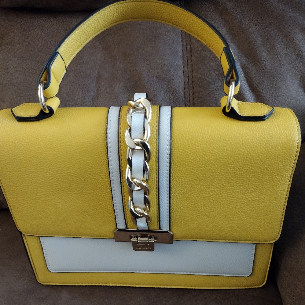 Excellent condition. Aldo brand, yellow purse